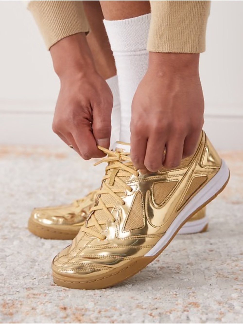Nike Women's Metallic Gold Athletic Sneakers